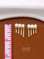 SWINGIN IN WIND - GOLDEN PEARL EARRINGS