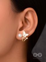 A WINGED WONDER - GOLDEN AND WHITE EAR JACKETS