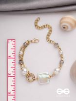 CLASSIC IVORY ALLURE - GOLDEN EMBELLISHED BRACELET WITH ANTI TARNISH COATING 