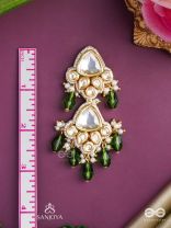 Kundalāṅgī-Kundan Elegance- Traditional pearl and Kundan earrings adorned with beads, stones, and green danglers for a regal touch.
