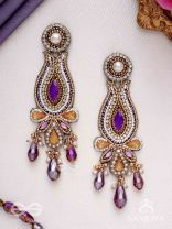 Divyaśhobhanā-Divine Splendour-Lotus-inspired embroidered design, adorned with purple and golden gem-studded motifs, Pearl and Beads.