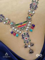 Prema raga- Love colour- Enamelled oxidized neckpiece embellished with beads, mirror and dangling jhumka.