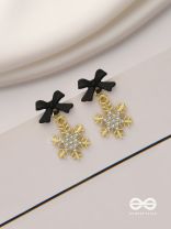 Nocturnal snowcharms- Dangling earrings with black velvety bows and golden stars 