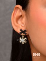 Nocturnal snowcharms- Dangling earrings with black velvety bows and golden stars 