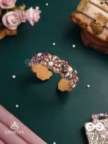 SHYAMALIKA – DARK BLOOM A FLORAL-INSPIRED BRACELET ADORNED WITH DARK-HUED GEMSTONES AND PEARLS