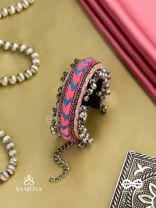 CHITRA DHARA – FLOW OF COLORS   EMBROIDERED BRACELET WITH A MIX OF COLORS AND INTRICATE THREAD WORK, ADORNED WITH GHUNGROO'S