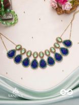 JALANEELINI - WATER LIKE BLUE ELEGANCE - BLUE TEARDROP SHAPES, GEMSTONES WITH GOLDEN EBELLISHED NECKLACE