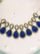 JALANEELINI - WATER LIKE BLUE ELEGANCE - BLUE TEARDROP SHAPES, GEMSTONES WITH GOLDEN EBELLISHED NECKLACE