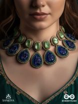 JALANEELINI - WATER LIKE BLUE ELEGANCE - BLUE TEARDROP SHAPES, GEMSTONES WITH GOLDEN EBELLISHED NECKLACE