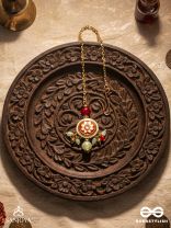 SHONAPRABHA- RADIANCE OF GOLD AND RED- HANDCRAFTED KUNDANMAANGTIKA  WITH GOLDEN MOONS AND RED BEADS