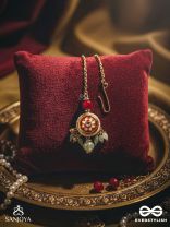 SHONAPRABHA- RADIANCE OF GOLD AND RED- HANDCRAFTED KUNDANMAANGTIKA  WITH GOLDEN MOONS AND RED BEADS