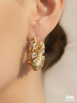 LUSTROUS SWIRLS-  INTRICATE TWISTED GOLD EARRINGS WITH SHIMMERING STONE