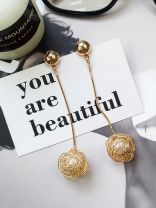Hanging on a string, Pearl in a Cage of Gold Earrings