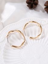 The Subtle Affirmation Golden Twists Hoop Earrings