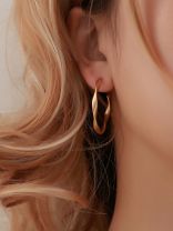 The Subtle Affirmation Golden Twists Hoop Earrings
