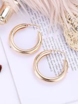 A Fashionista’s Dream - Glittering gold loops