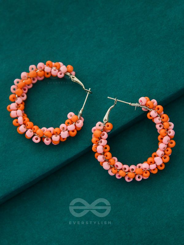 The Beaded Twists - Statement Hoops (Orange-Pink)