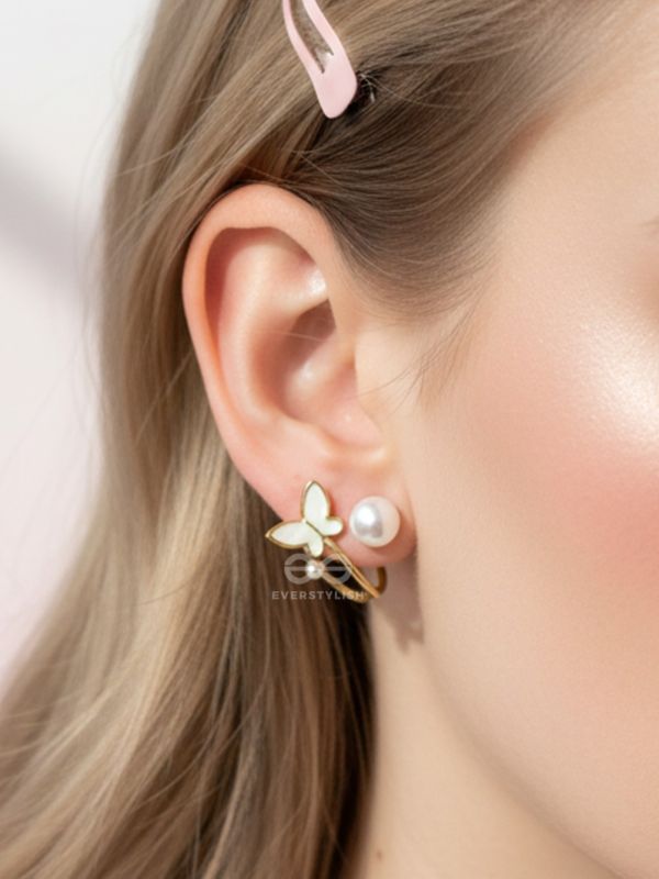 A WINGED WONDER - GOLDEN AND WHITE EAR JACKETS