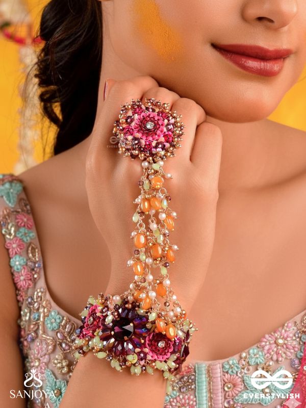 VARNAMALA ABHUSHANA - ADORNMENT OF COLORS - GOLDEN BEADS WTH COLORFUL FLORAL MOTIFS BRACELET ATTACHED WITH ADJUSTIBLE RING