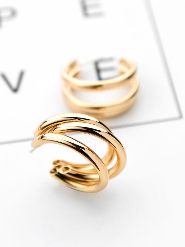 The Elegant Statement Makers - Golden Stud Earrings