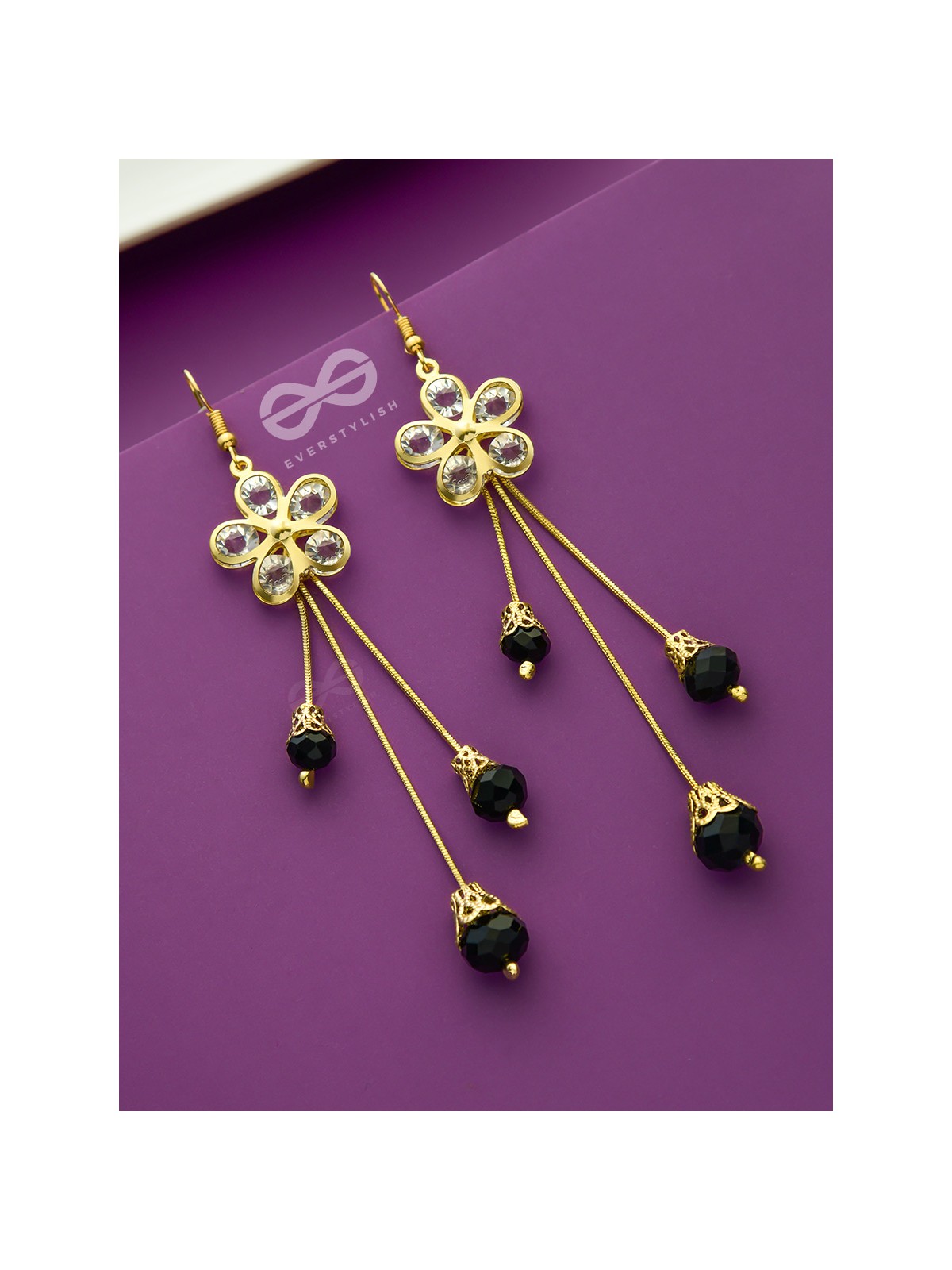 The floral augmented charm- Golden dangler earrings