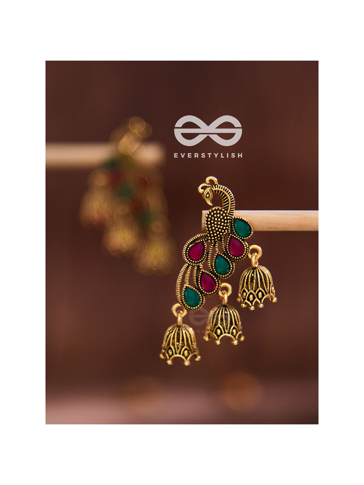 The magnificent meryll Intricate Peacock jhumkis (Golden)