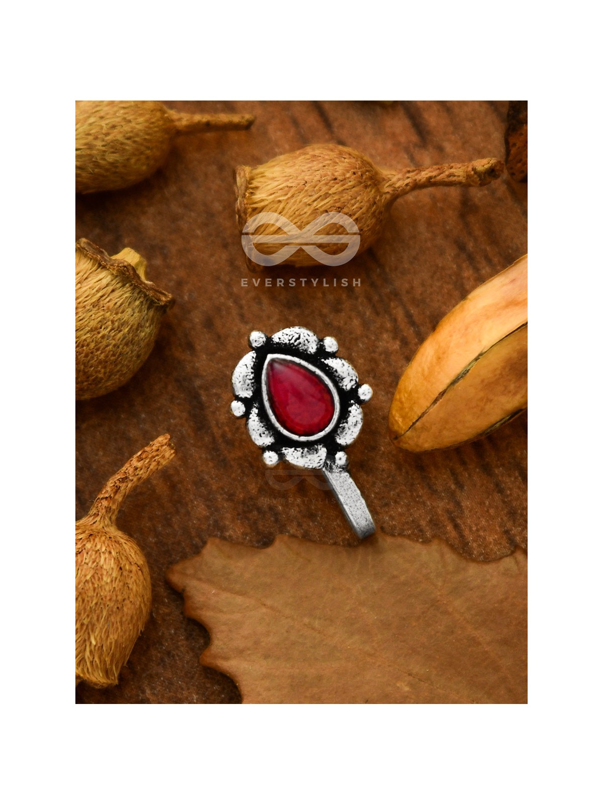 The glowing ember- oxidized non pierced nosepin (ruby red)