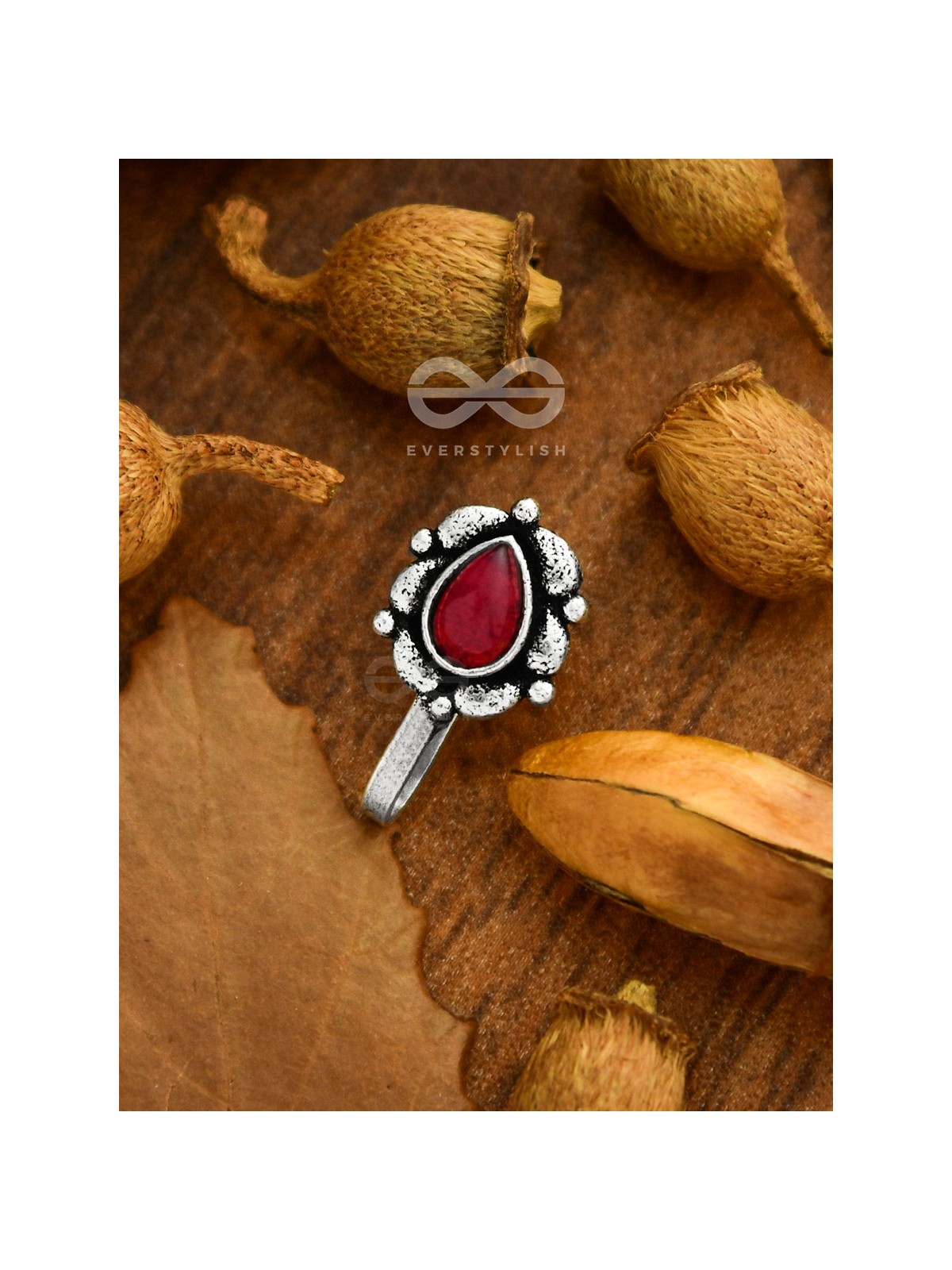 The glowing ember- oxidized non pierced nosepin (ruby red)