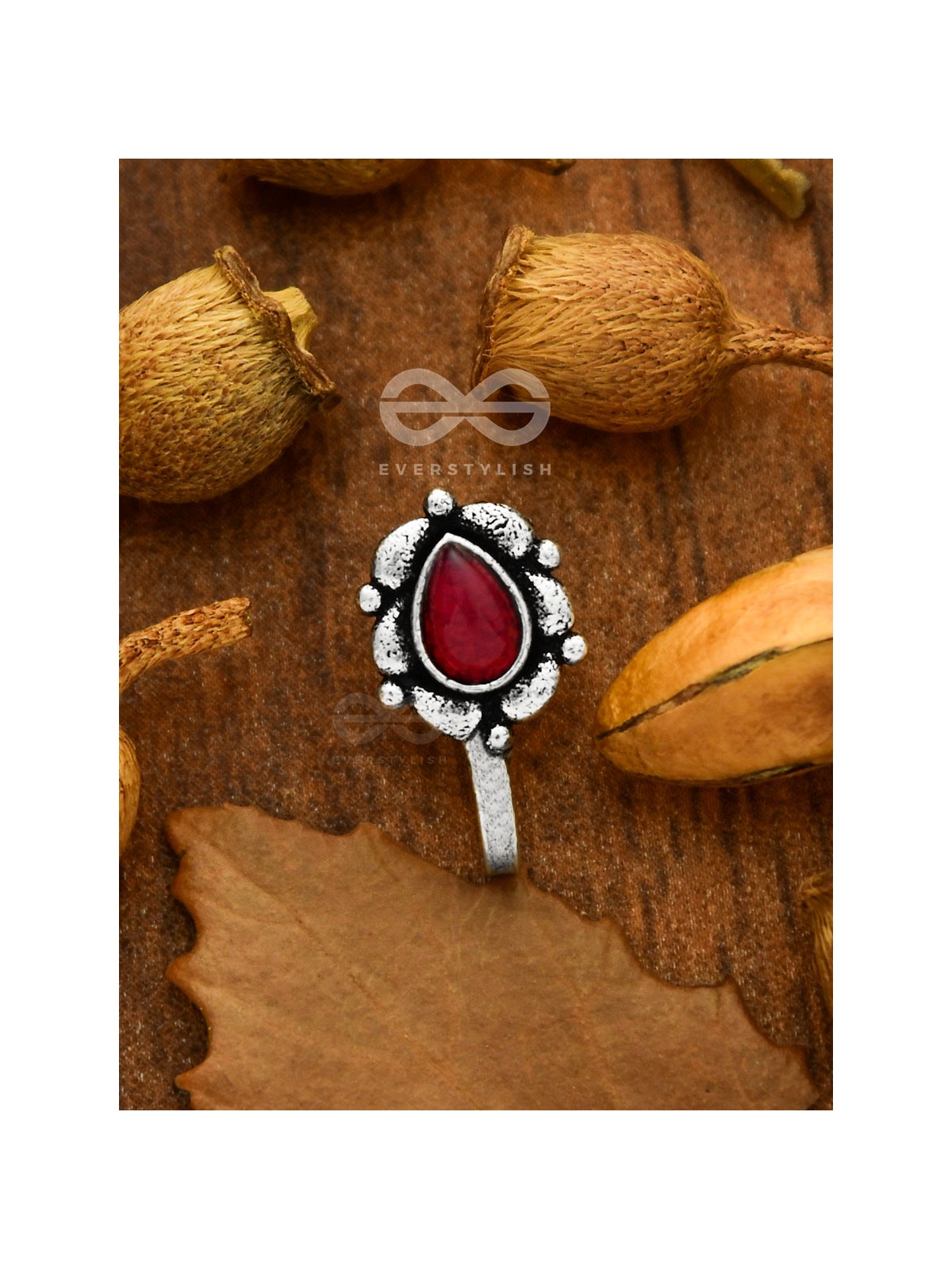 The glowing ember- oxidized non pierced nosepin (ruby red)