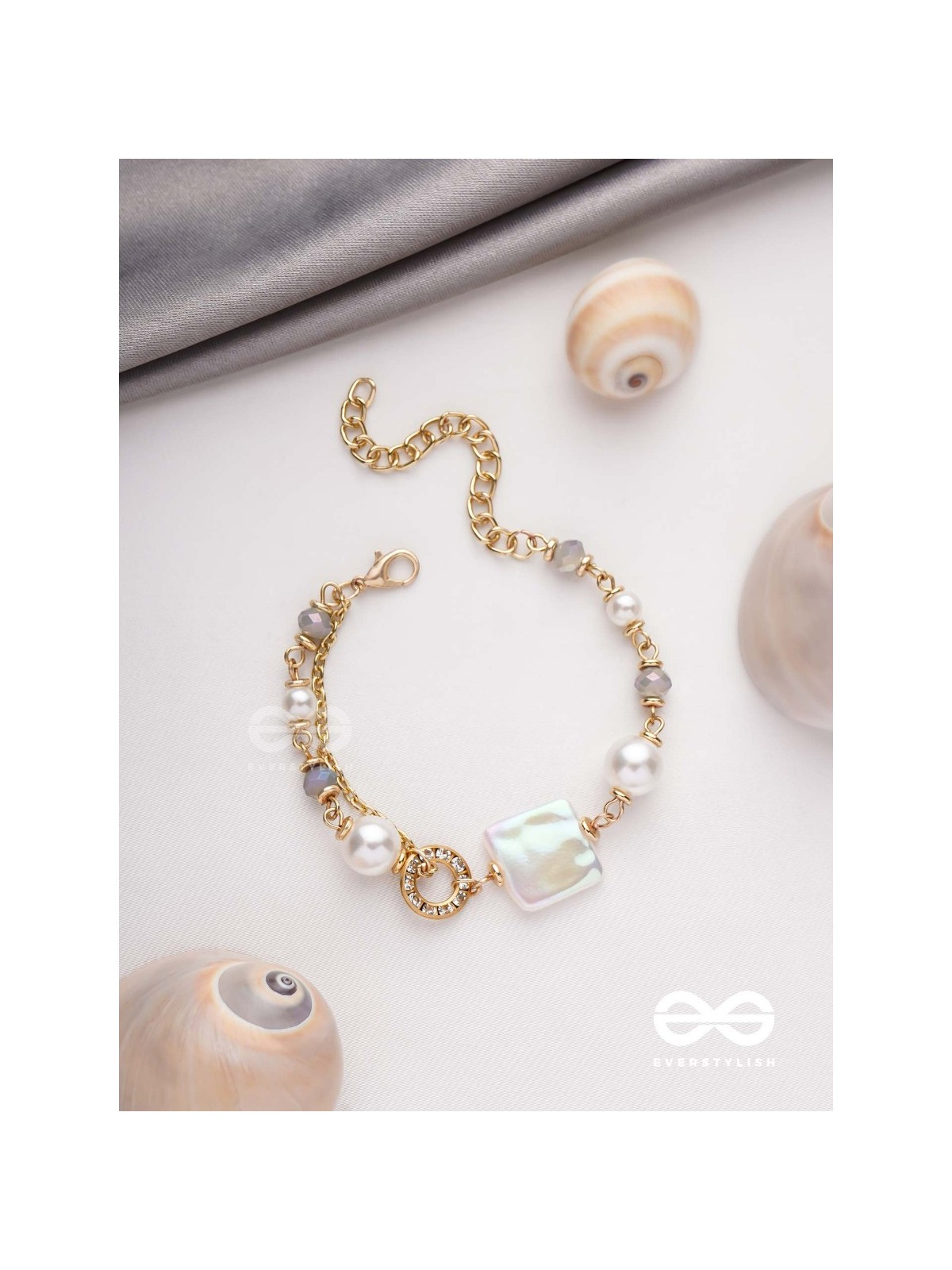 CLASSIC IVORY ALLURE - GOLDEN EMBELLISHED BRACELET WITH ANTI TARNISH COATING 