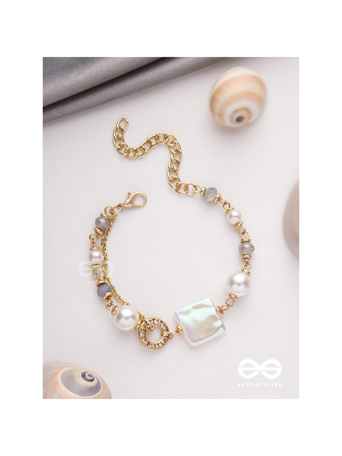 CLASSIC IVORY ALLURE - GOLDEN EMBELLISHED BRACELET WITH ANTI TARNISH COATING 
