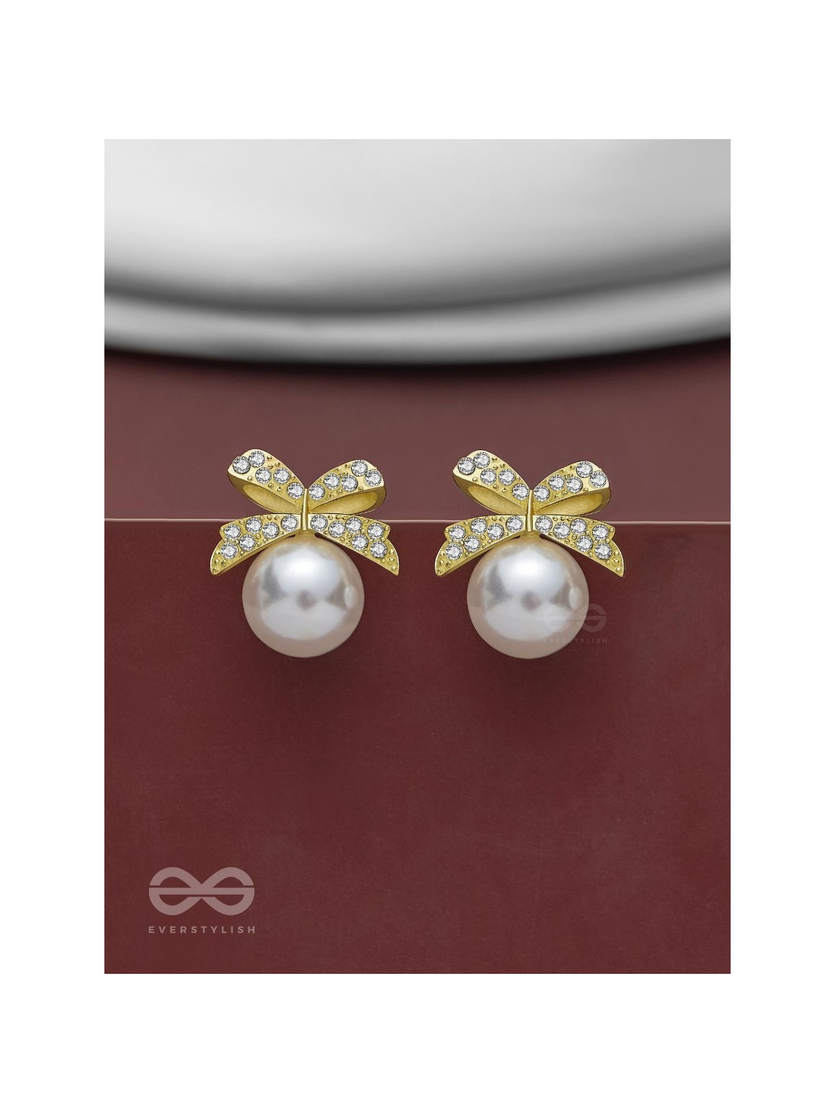 BOW-DAZZLE PEARLS - GOLDEN AND WHITE EMBELLISHED EARRINGS