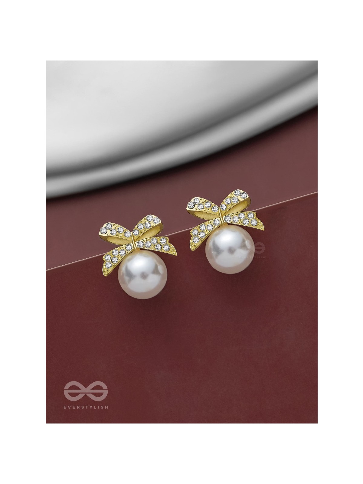 BOW-DAZZLE PEARLS - GOLDEN AND WHITE EMBELLISHED EARRINGS