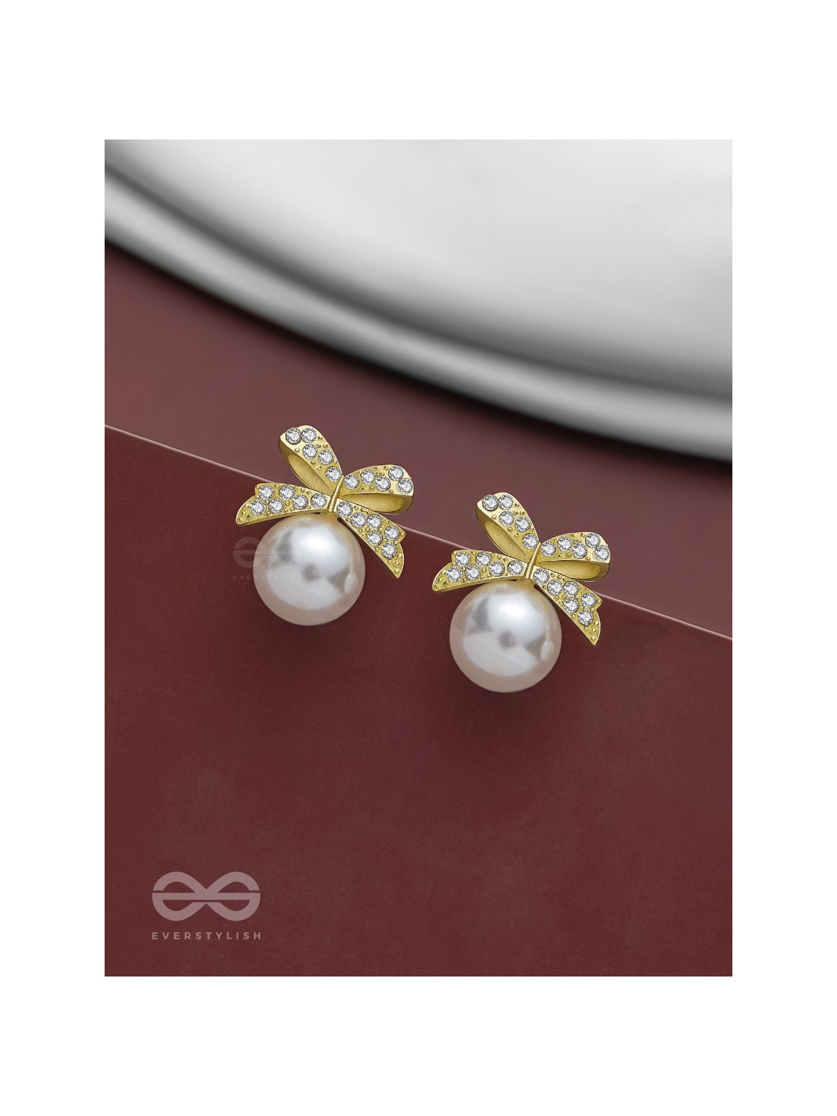 BOW-DAZZLE PEARLS - GOLDEN AND WHITE EMBELLISHED EARRINGS