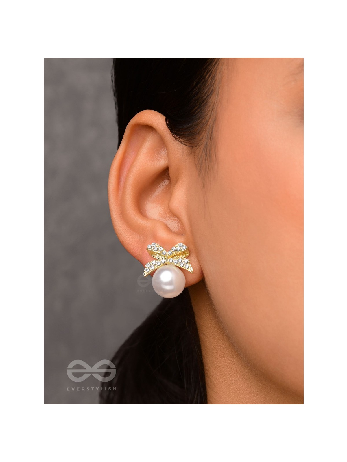 BOW-DAZZLE PEARLS - GOLDEN AND WHITE EMBELLISHED EARRINGS
