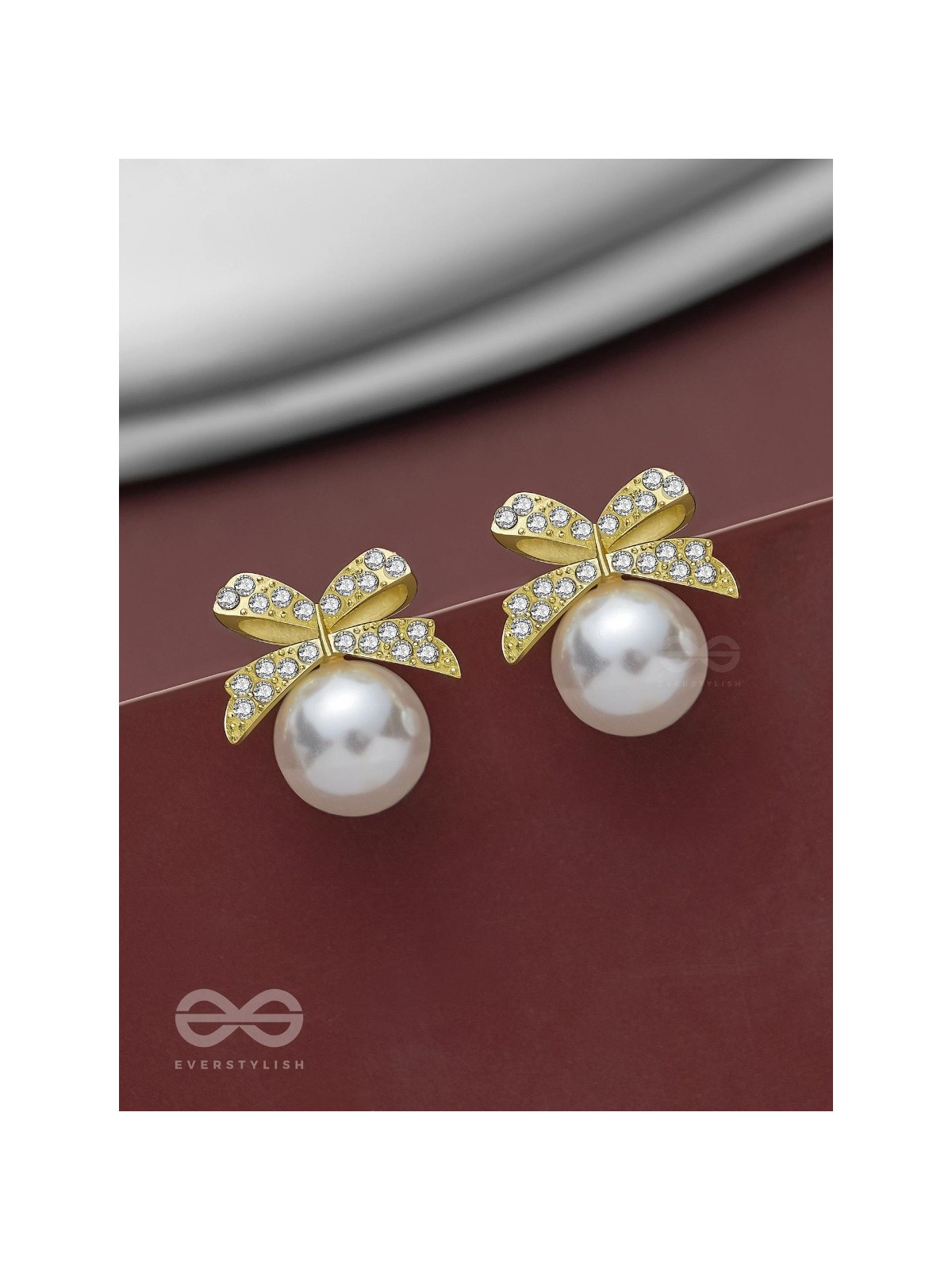 BOW-DAZZLE PEARLS - GOLDEN AND WHITE EMBELLISHED EARRINGS
