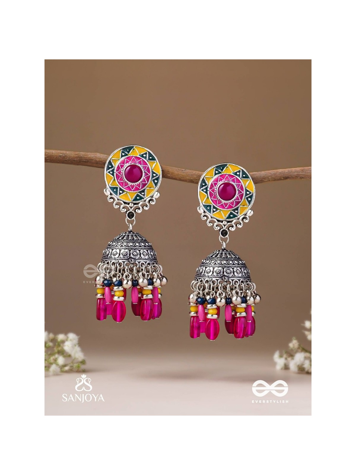 Suryaruchi-Sun's Radiance-Lavish pink earrings enamelled with a sun motif and oxidized jhumka adorned with beads and ghunghroos