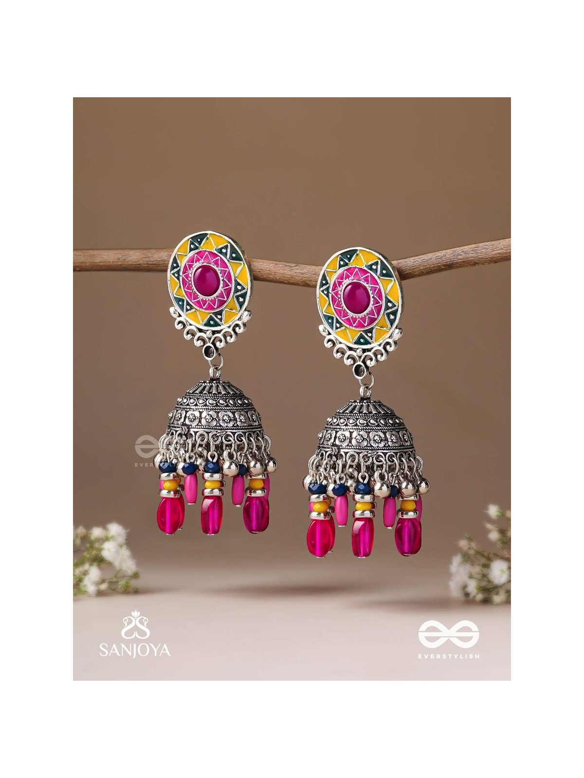 Suryaruchi-Sun's Radiance-Lavish pink earrings enamelled with a sun motif and oxidized jhumka adorned with beads and ghunghroos