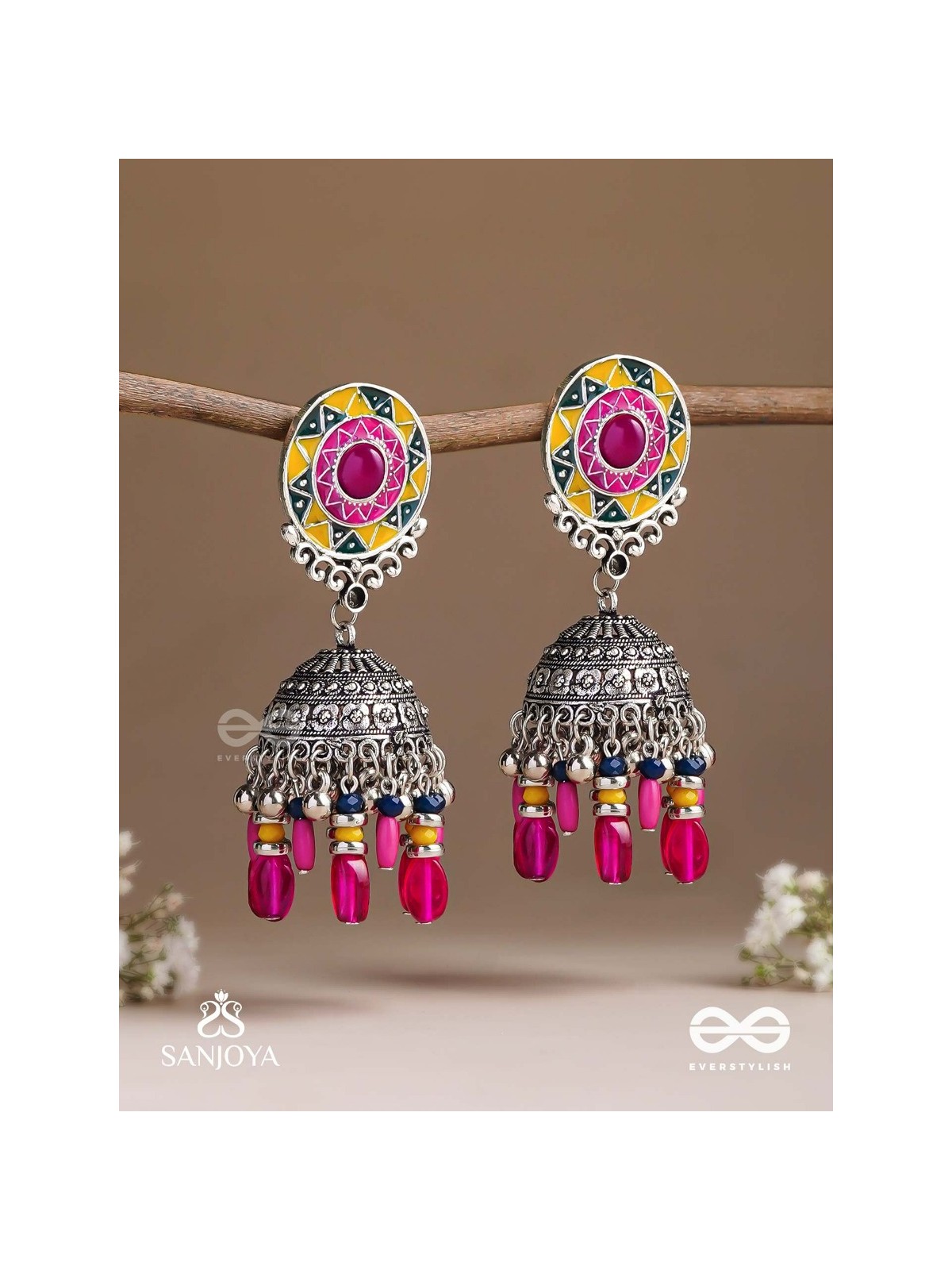 Suryaruchi-Sun's Radiance-Lavish pink earrings enamelled with a sun motif and oxidized jhumka adorned with beads and ghunghroos