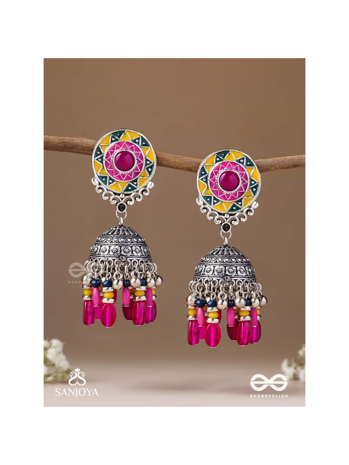 Suryaruchi-Sun's Radiance-Lavish pink earrings enamelled with a sun motif and oxidized jhumka adorned with beads and ghunghroos