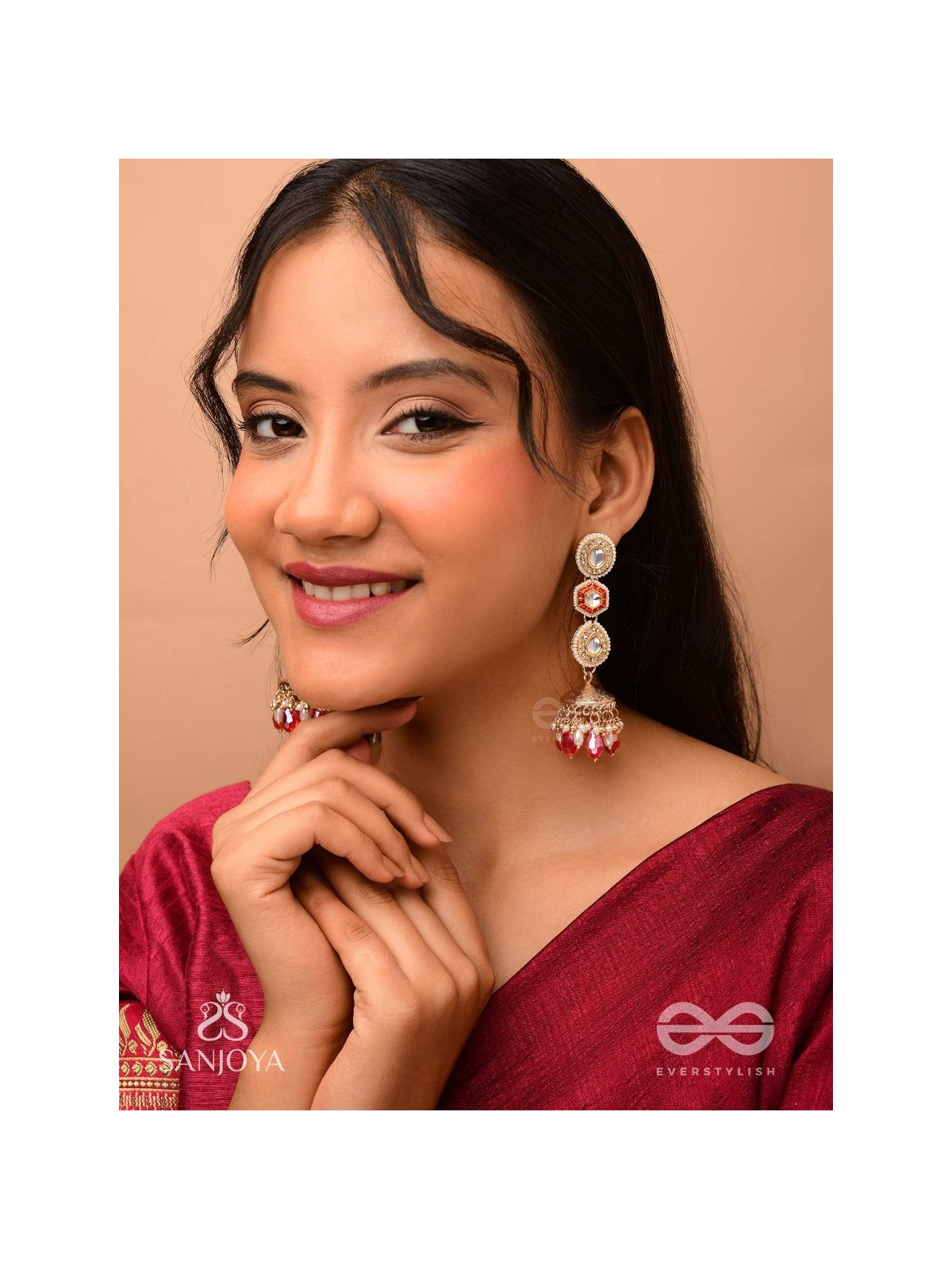 Suvarnmani - The Golden Gem –Golden enamel earrings adorned with gemstones and dangling beads