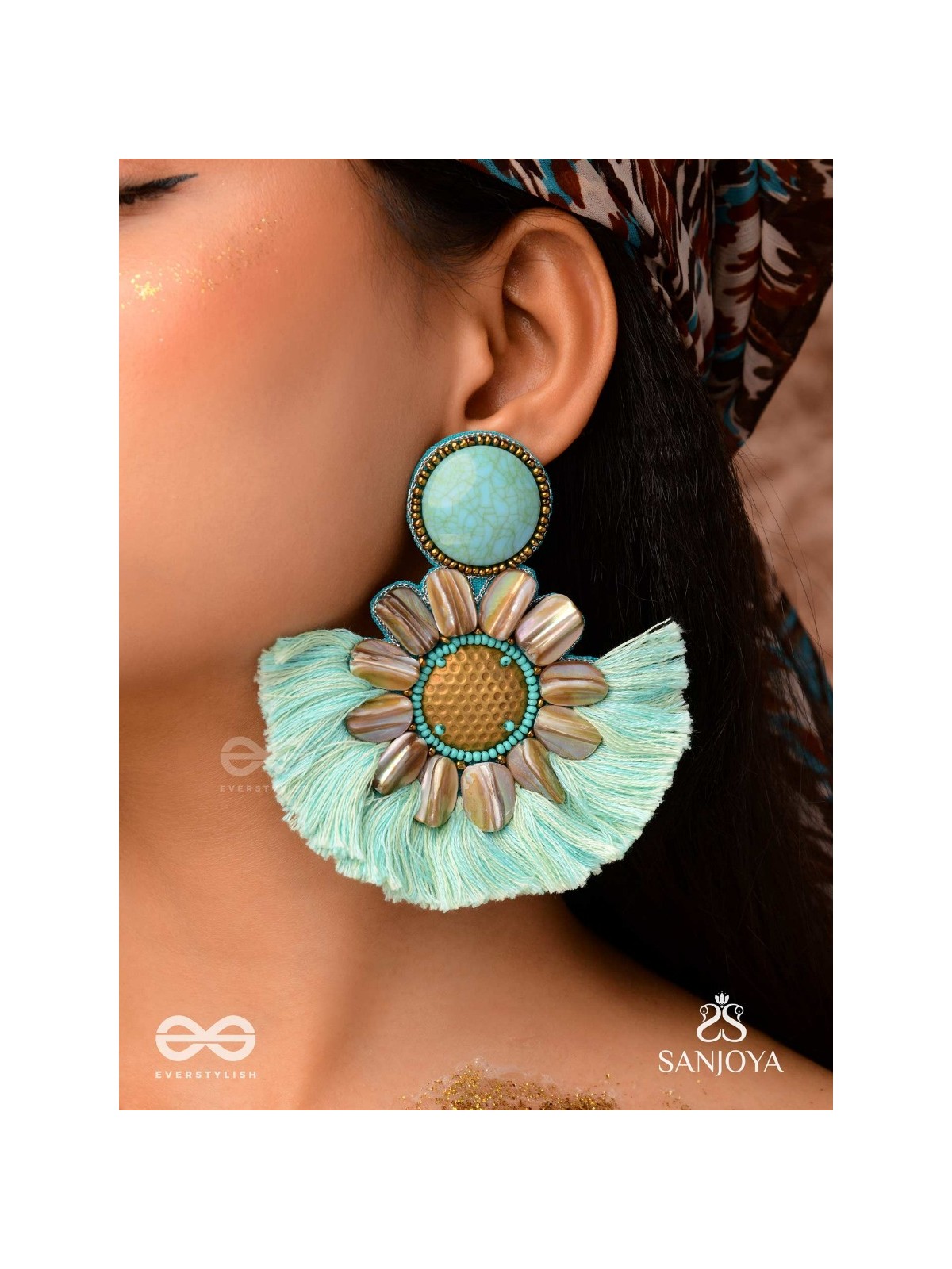 Vibhusitpuspa - the adorned flower - embroidered flower earrings with turquoise tassles