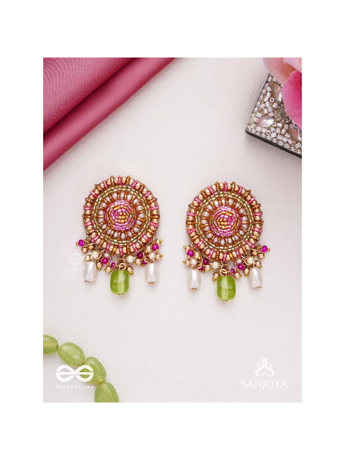 Māṇikyamāṇḍala- Gem Mandala-Circular motifs embellished with pink and golden accents, beads, and stones