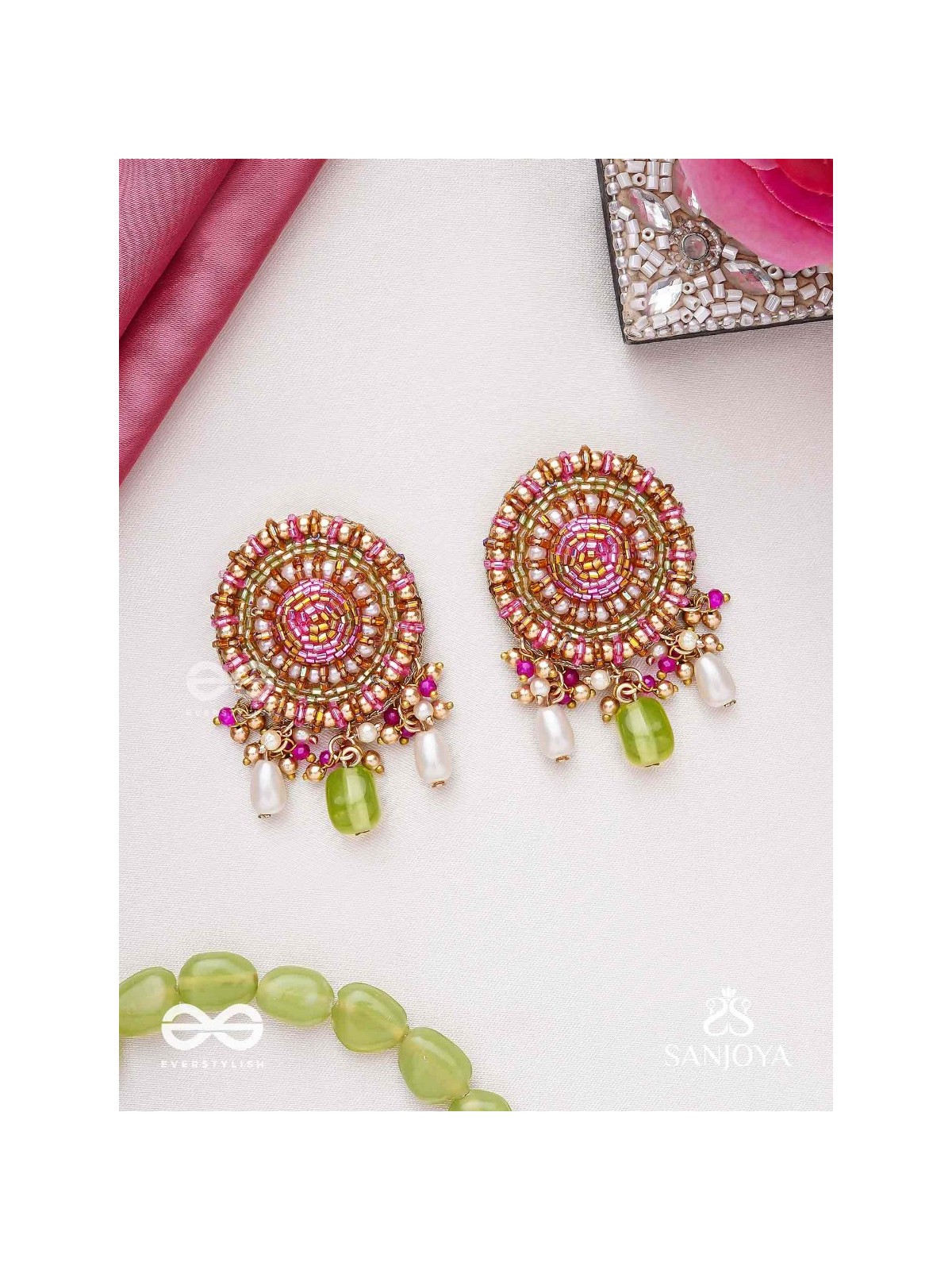 Māṇikyamāṇḍala- Gem Mandala-Circular motifs embellished with pink and golden accents, beads, and stones