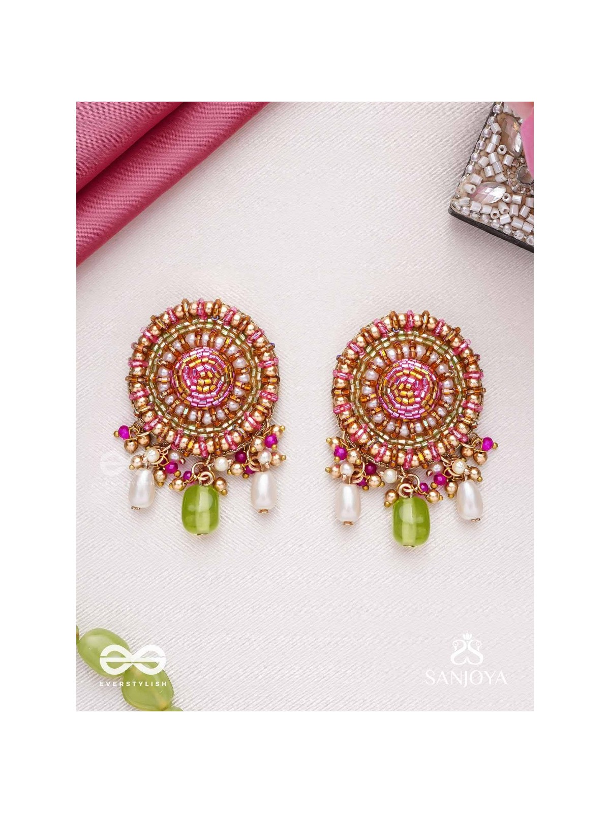Māṇikyamāṇḍala- Gem Mandala-Circular motifs embellished with pink and golden accents, beads, and stones