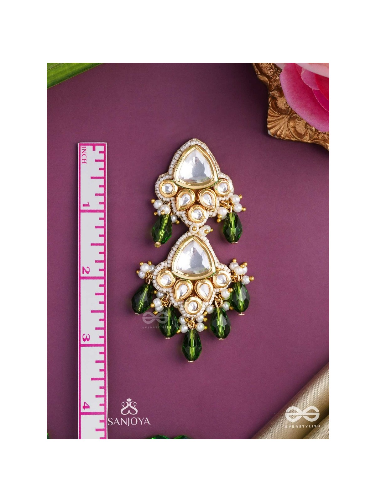 Kundalāṅgī-Kundan Elegance- Traditional pearl and Kundan earrings adorned with beads, stones, and green danglers for a regal touch.