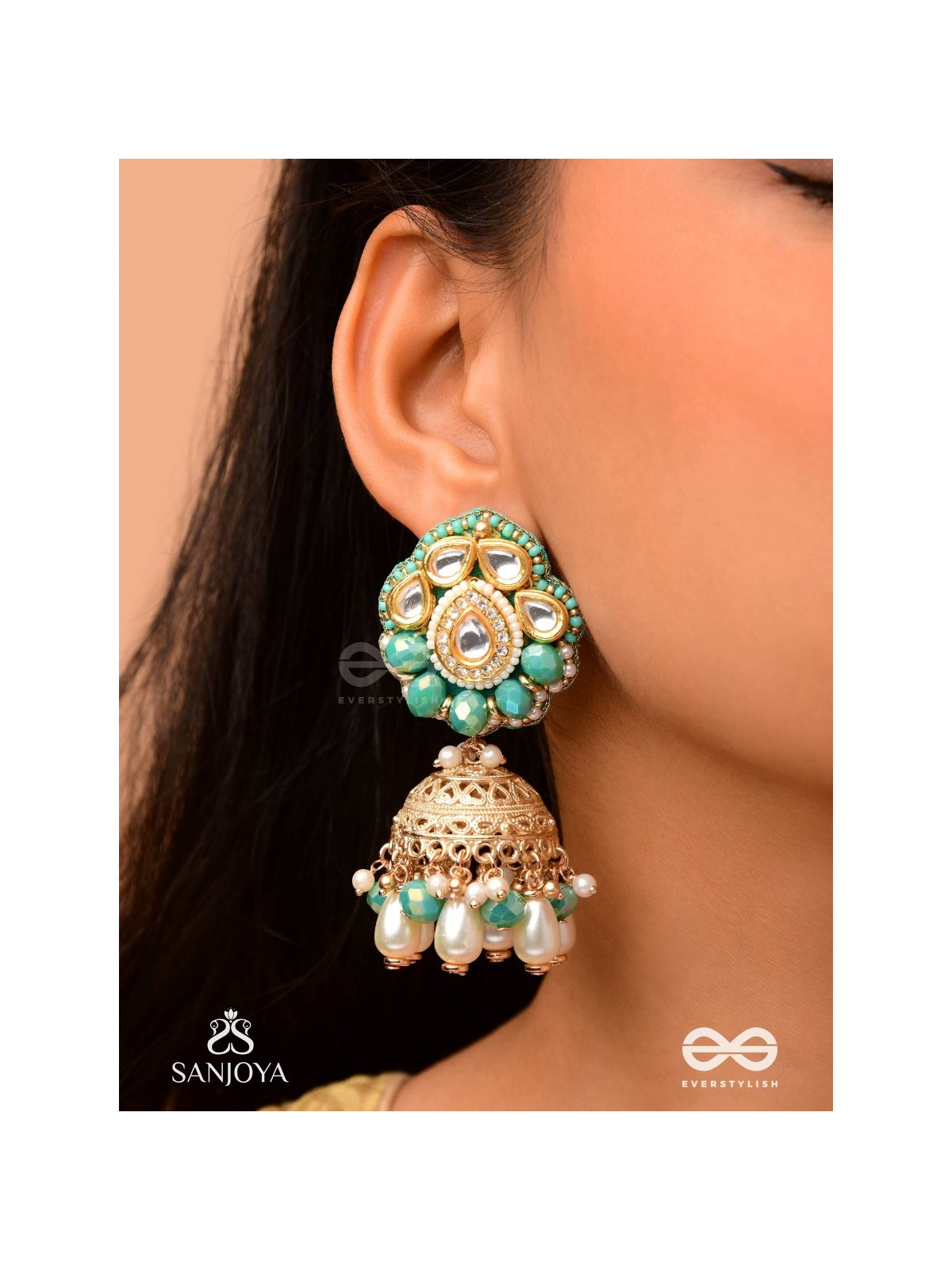 Sphārikā- Crystal Radiance-Jhumka earrings adorned with diamond shaped stones,beads and pearls of golden, white and turquoise accents