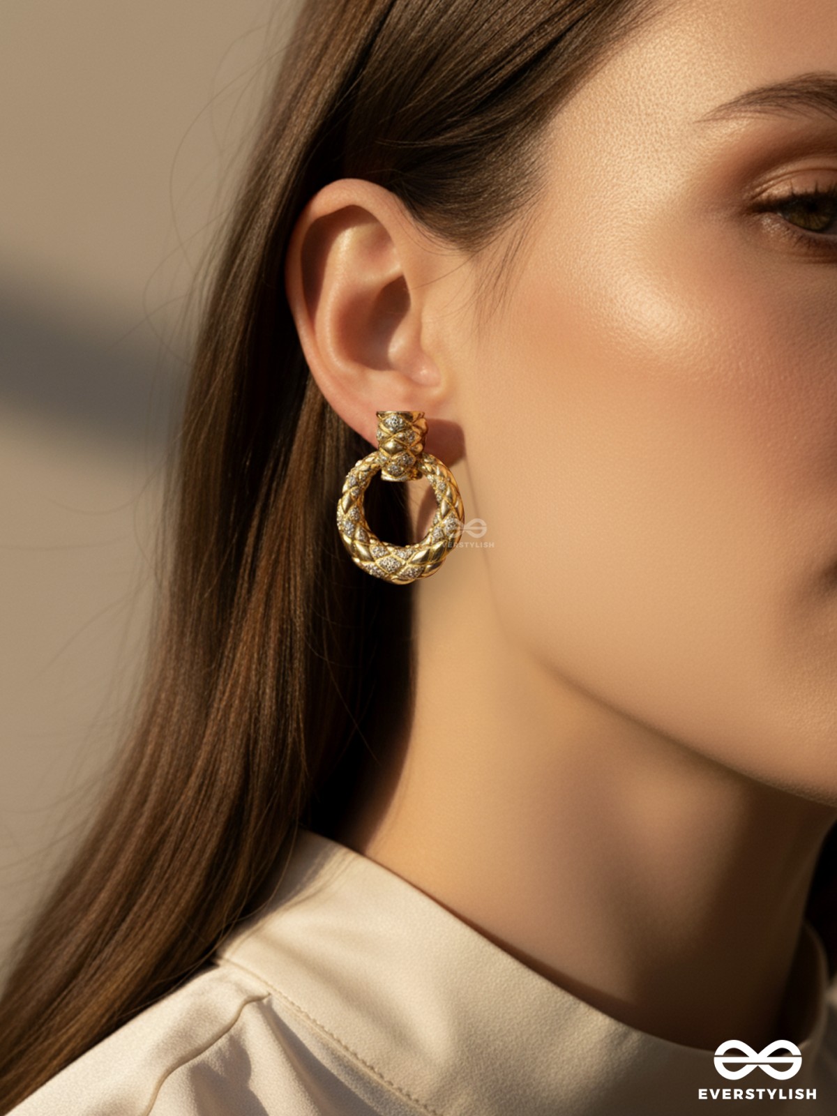 TWISTED GLOW- 18K GOLD PLATED ANTI-TARNISH GOLDEN TEXTURED LUXURY EARRINGS INLAID WITH CUBIC ZICRONIA STONES