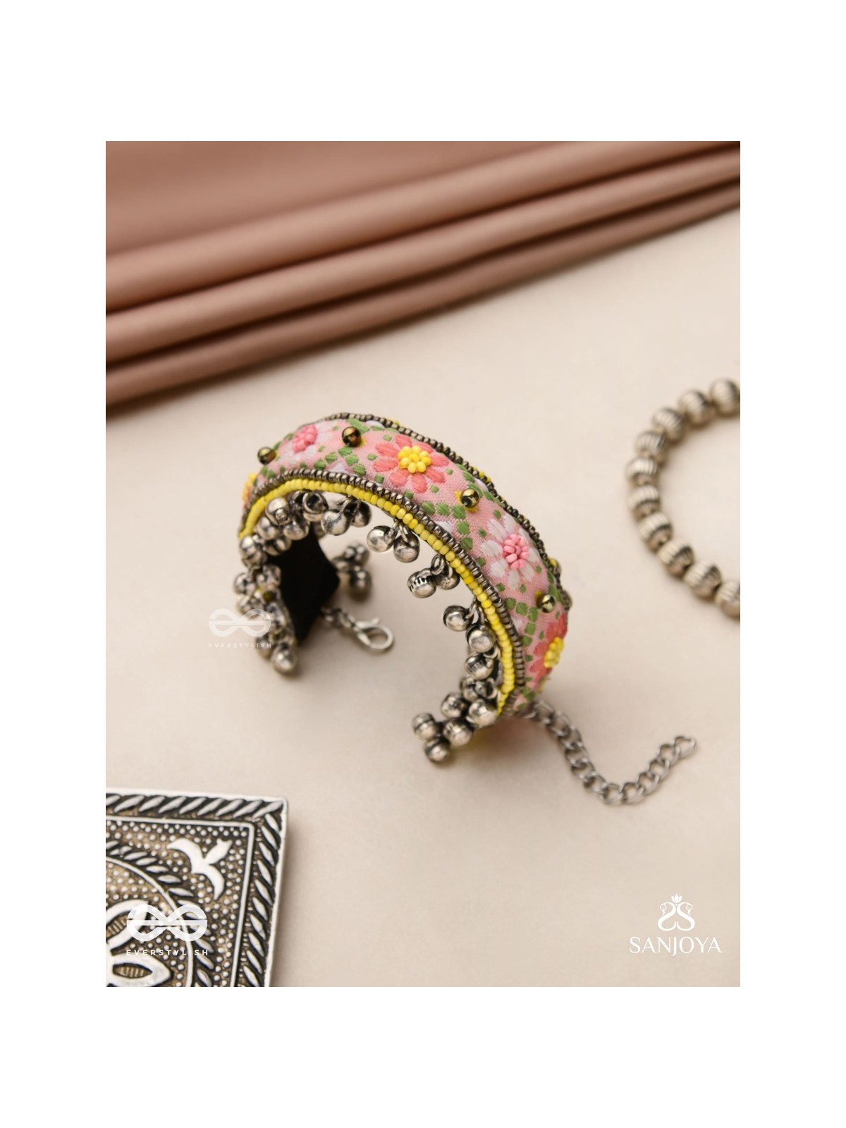 SUMANALEKHA-FLORAL PATTERN- SEMI-OXIDIZED BRACELET FEATURES GHUNGROO, BEADS, AND EMBROIDERED FLOWERS