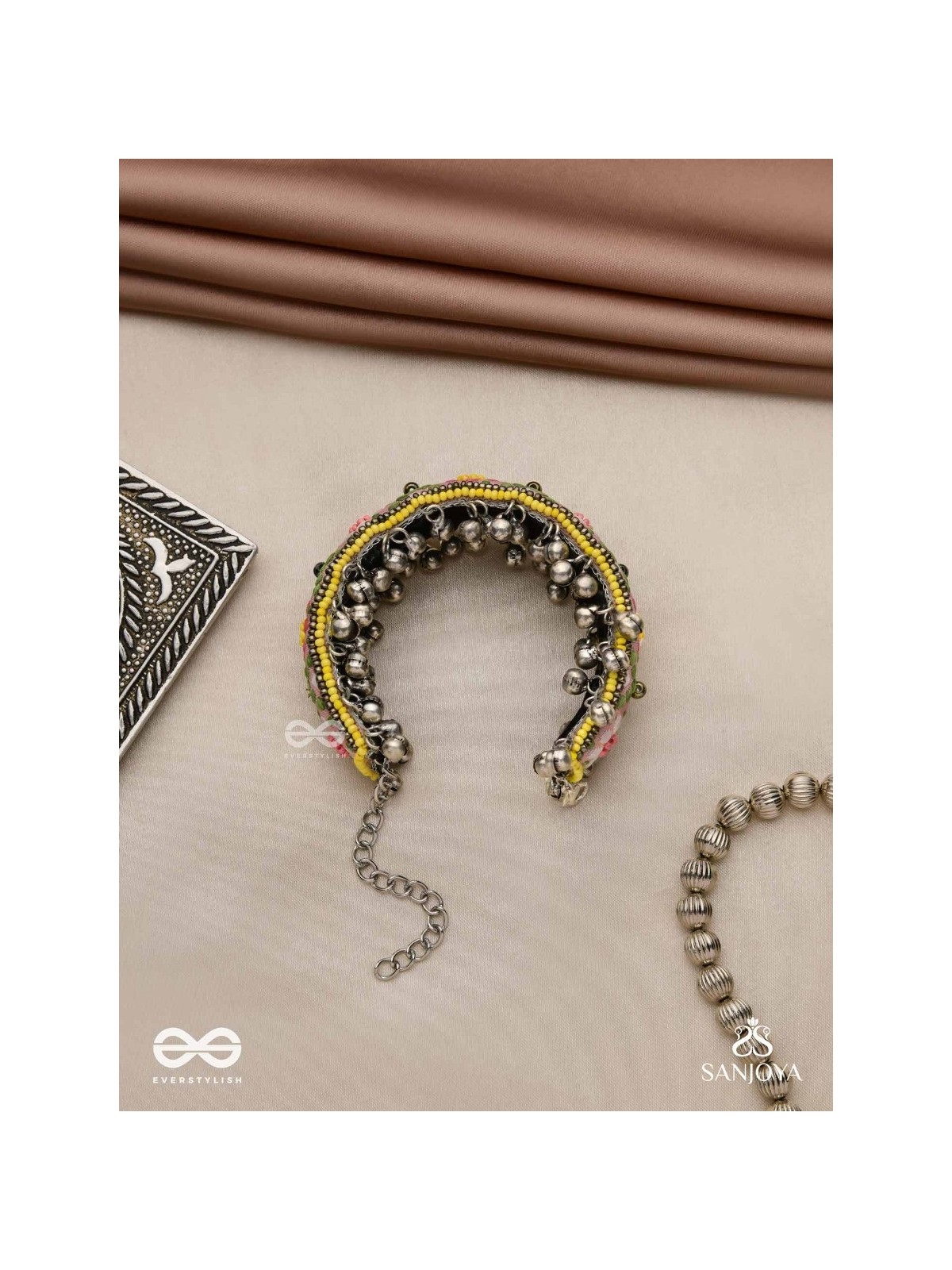 SUMANALEKHA-FLORAL PATTERN- SEMI-OXIDIZED BRACELET FEATURES GHUNGROO, BEADS, AND EMBROIDERED FLOWERS